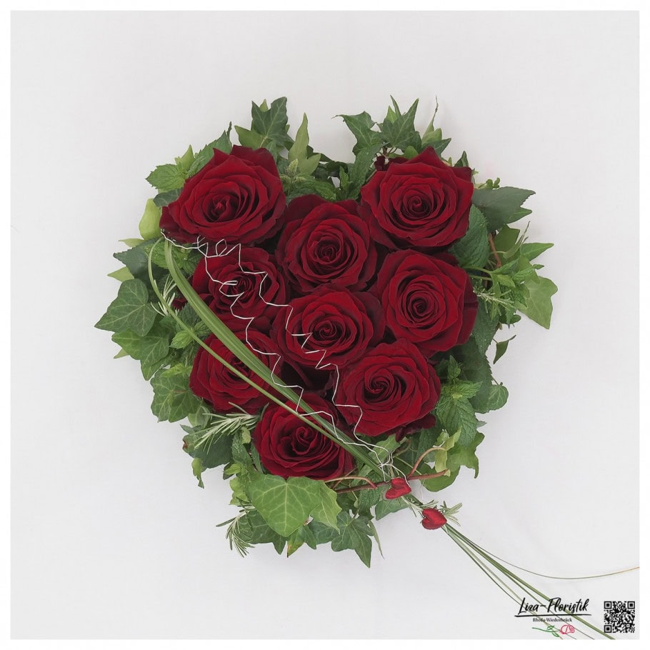 Gesteck mit Efeu und roten Rosen Explorer